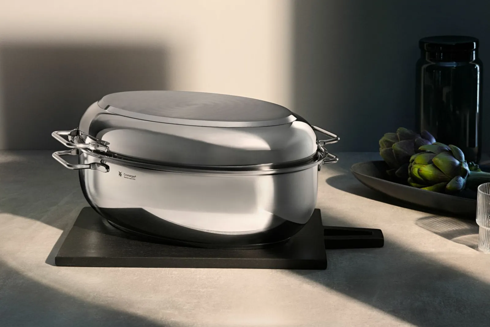 Bräter & Schmortöpfe>WMF Extrabräter mit Metalldeckel silberfarben