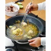 Küchenhelfer>WMF Wok-Abseihlöffel 36cm silberfarben